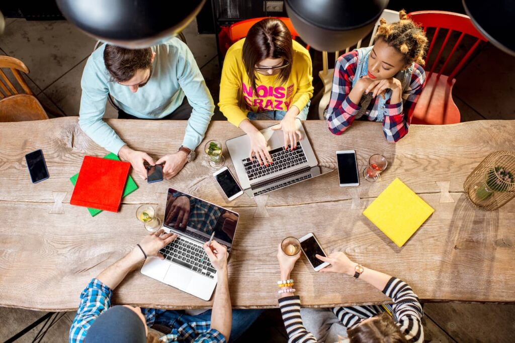 People Working with Laptops and Phones